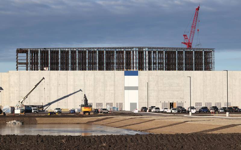 Work continues at the site of the Kraft Heinz Company distribution center Wednesday, Dec. 13, 2023, in the ChicagoWest Business Center in DeKalb.