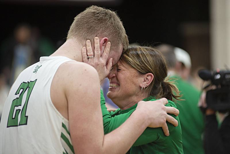 Scales Mound's Ben Warner celebrates the Hornet's victory over Newman in the sectional final Friday, March 4, 2022.
