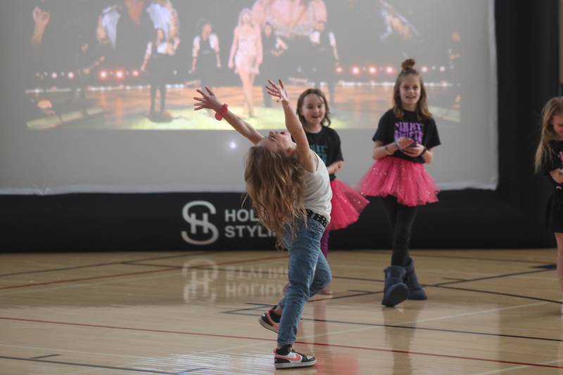 Addison Tomczak, 7-years old, shows off her dance moves at the Taylor Swift fan party hosted by the Lockport Township Park District on Saturday, Feb. 10, 2024 in Lockport.