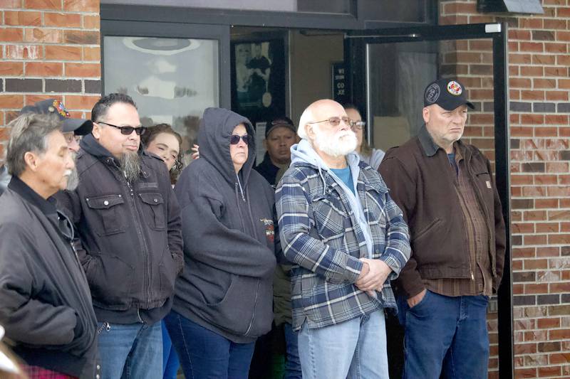 Attendees at the flag ceremony for Veterans Day at the Stone City VFW Post 2199, 124 Stone City Drive, Joliet, on Tuesday, Nov. 11, 2025.
