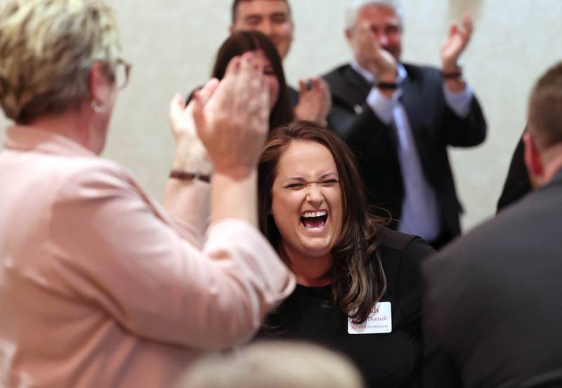 Cindy Green-Deutsch reacts as she is announced as the 2022 recipient of the Athena Award Tuesday, Oct. 18, 2022, during the Athena and Women of Accomplishment Award reception at the Barsema Alumni and Visitors Center at Northern Illinois University in DeKalb.