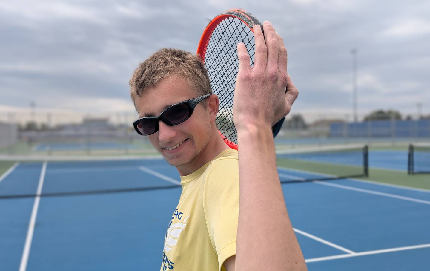 Johnsburg senior Tyler Batt poses for a picture on his home tennis court Saturday, May 9, 2026, in Johnsburg. He seeks his fourth trip to state this month.