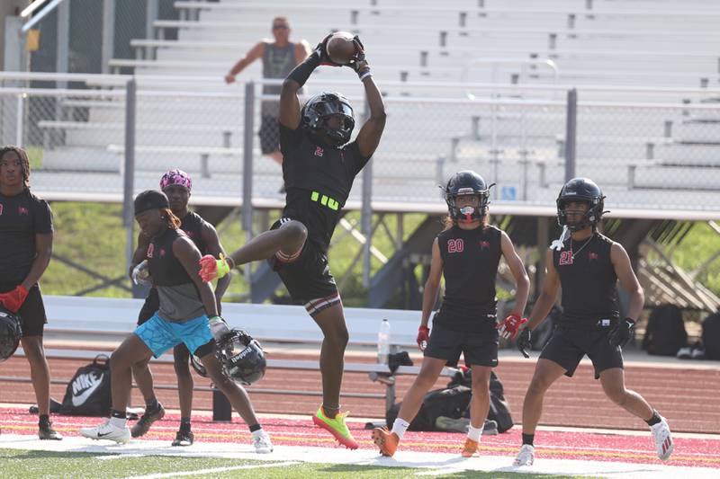 Bolingbrook’s Kyan Berry Johnson makes a leaping catch at the Morris 7 on 7 scrimmage. Tuesday, July 19, 2022 in Morris.