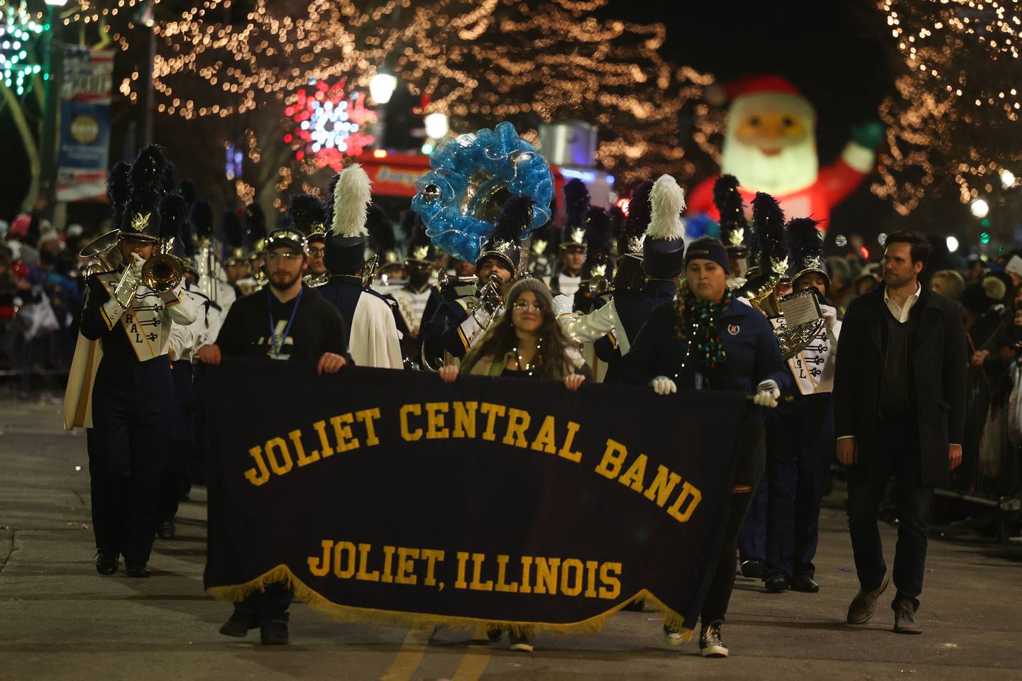 Joliet Central Band performs at the Light Up the Holidays Festival and Parade in downtown Joliet.