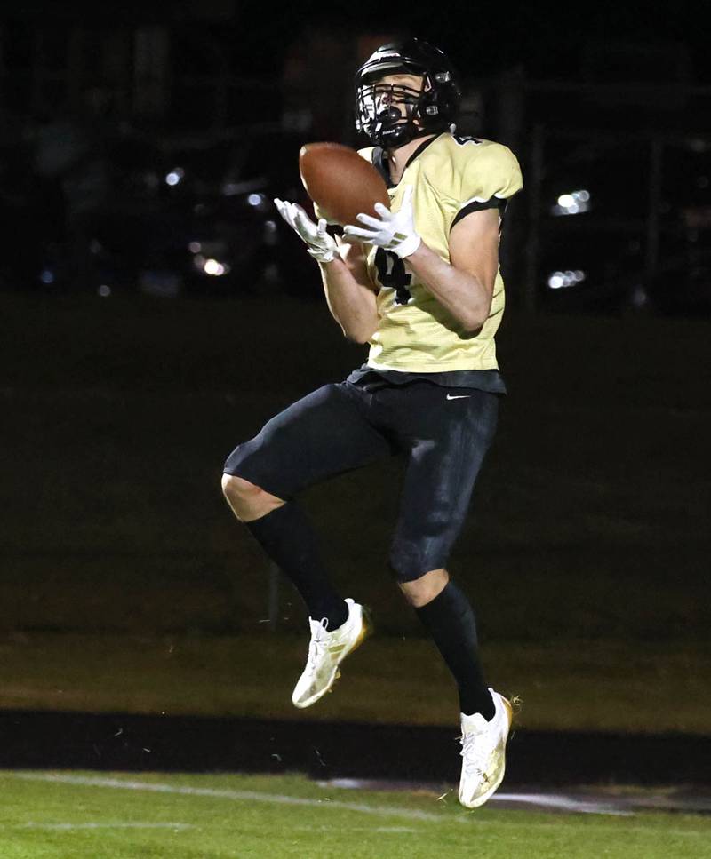 Sycamore's Aidan Wyzard reels in his second touchdown of the game against Cahokia Friday, Oct. 25, 2024, at Sycamore High School.