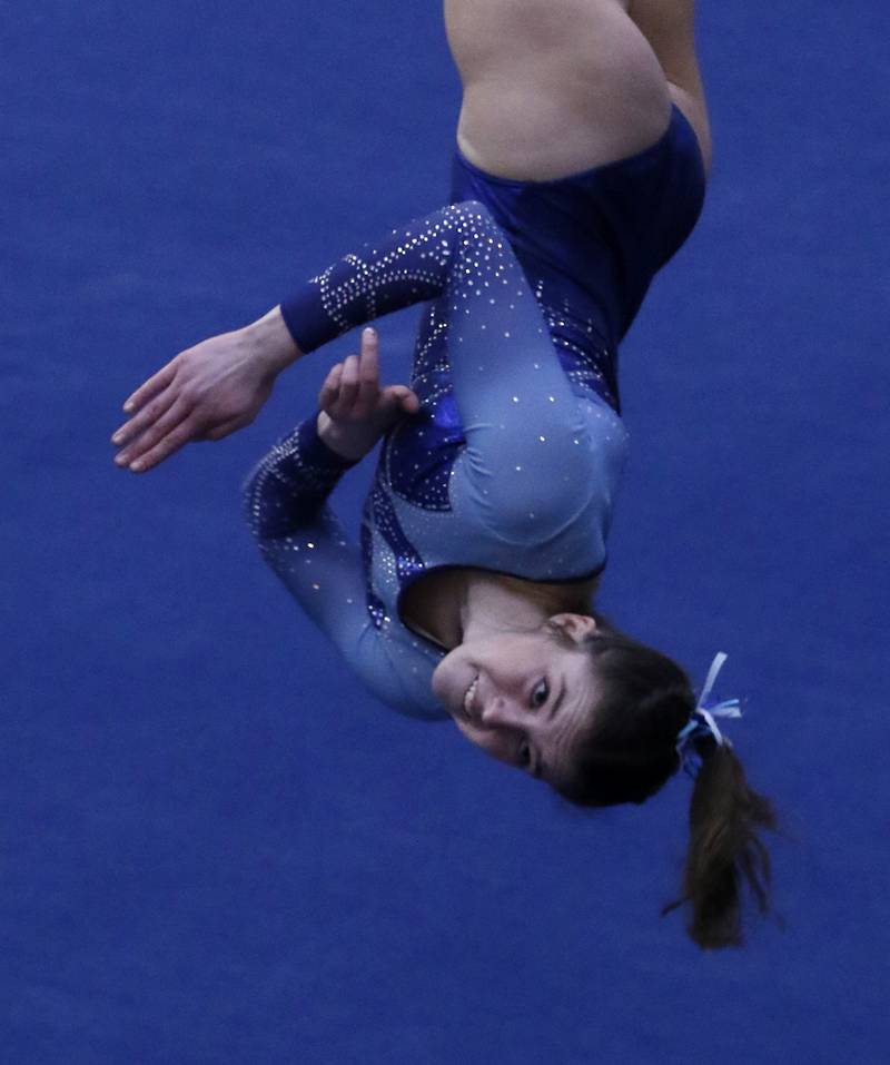 Lake Park's Cali Keefe competes in the preliminary round of the floor exercise Friday, Feb. 17, 2023, during the IHSA Girls State Final Gymnastics Meet at Palatine High School.