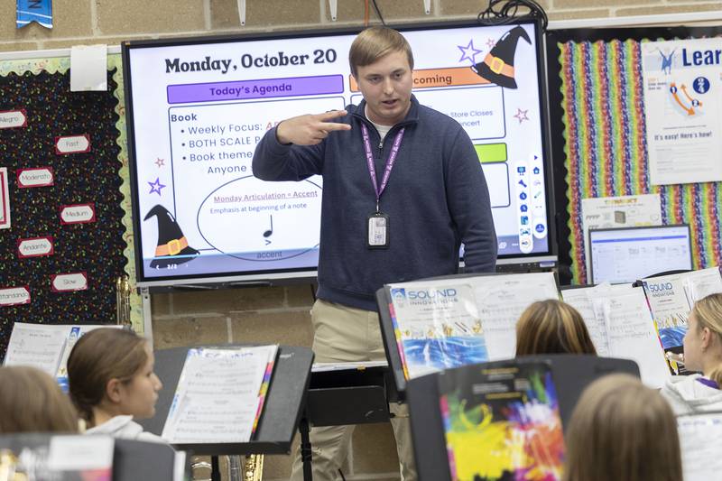 Teacher Christopher Hansen teaches his music students about accent notes Monday, Oct. 20, 2025, at Reagan Middle School.