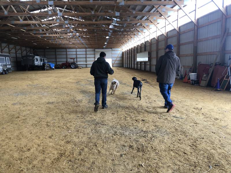 David Kerpel of Furever Home Dog Sanctuary, left, gives a tour of the non-profit's future facility to Matthew Ryan, of FurEver Home Coffee on Sunday, Jan. 7, 2024. Two dogs that live in a home nearby joined them.