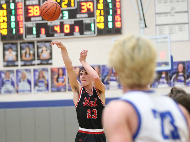 Hall's Braden Curran shoots a wide-open shot over Princeton on Friday, Jan. 26, 2024 at Princeton High School.