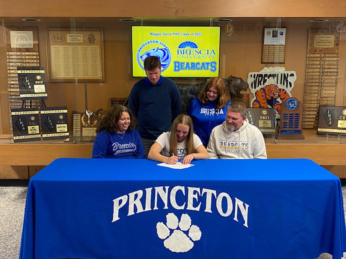 PHS senior Maggie Davis recently signed with Brescia University to play soccer next year. Davis was a key defender for the Tigresses' regional championship team. She was joined at her signing by her parents (front row), Julie and Bill Kuhne; and (back row) PHS coach David Gray and her sister Abby.