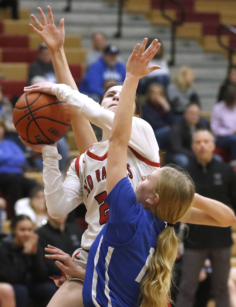 Huntley's Alyssa Borzych shoots the ball over Burlington Central's Kenzie Andersen during a Fox Valley Conference girls basketball game Friday, Feb.2, 2024, at Huntley High School.