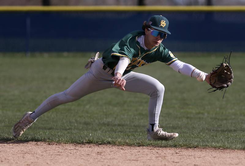 Crystal Lake South's Christian Alther fields the ball during a Fox Valley Conference baseball game against Burlington Central on Friday, April 12, 2024, at Burlington Central High School.