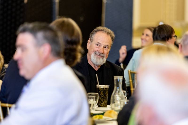 Joliet Slammers Co-Owner Mike Veeck enjoys the May Member Luncheon presented by the Joliet Region Chamber of Commerce & Industry at the Renaissance Center on May 23, 2024.