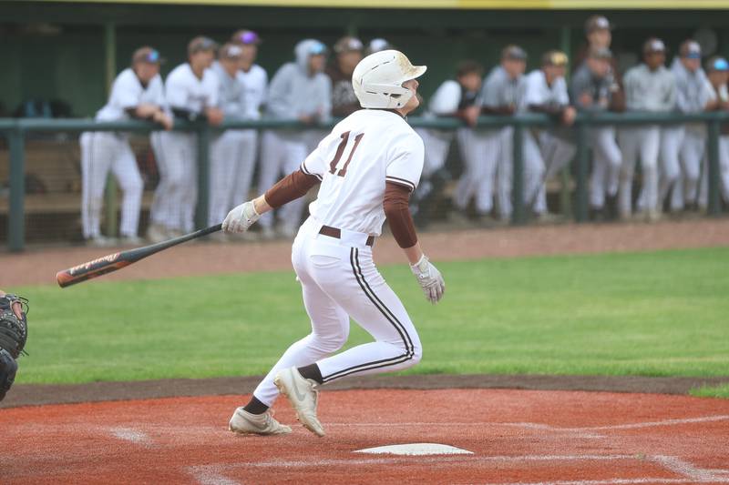 Joliet Catholic’s Koen Lynes drives in a run against Nazareth on Wednesday, April 29, 2026 in Joliet.