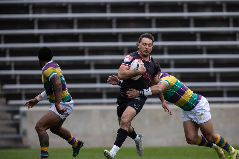 Chicago Hounds' full-back Christopher Mattina  tries to shed a tackle against NOLA Gold at Seat Geek Stadium in Bridgeview, on Sunday April 23, 2023.