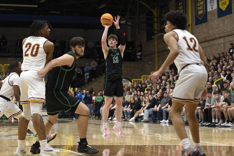 Rock Falls’ Ryken Howard puts up a shot against Christ the King Monday, March 10, 2025, during the Class 2A boys basketball Supersectional in Sterling.