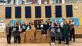 Local Rotarians help donate 2,000 books to Ukrainian refugee children in Chicago schools