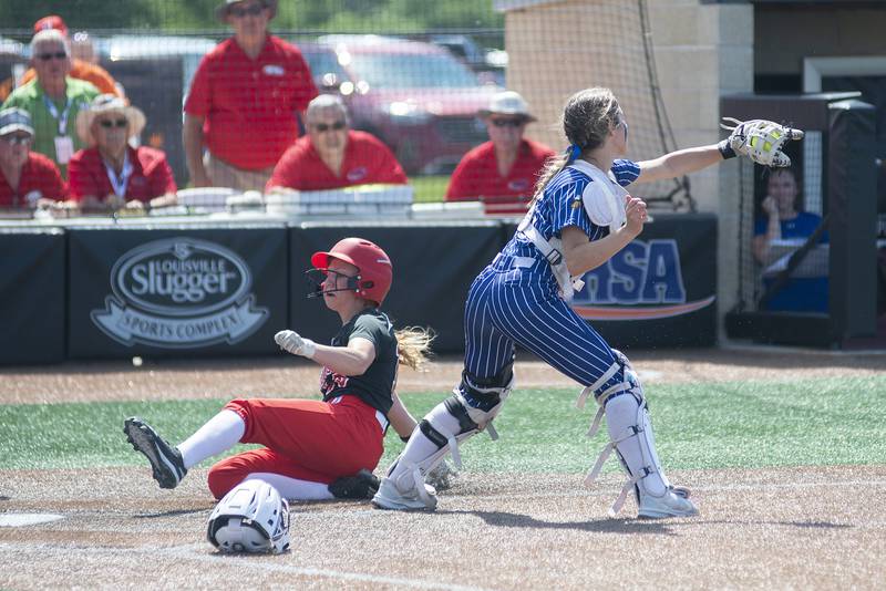 Forreston’s Kara Erdmann comes in to score against Newark Saturday, June 4, 2022 during the IHSA Class 1A softball state third place game.