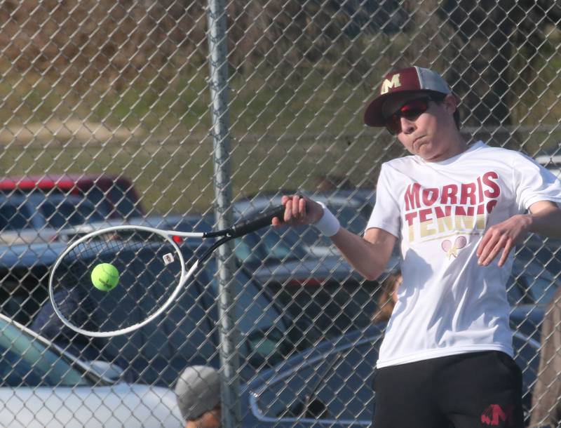 Morris's Conor Barth plays tennis against Ottawa on Tuesday, March 28, 2023 at Ottawa High School.