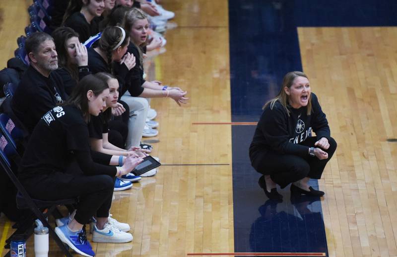 Geneva head coach Sarah Meadows shouts to her players during Friday’s IHSA Class 4A girls basketball regional championship game against Conant in Hoffman Estates.