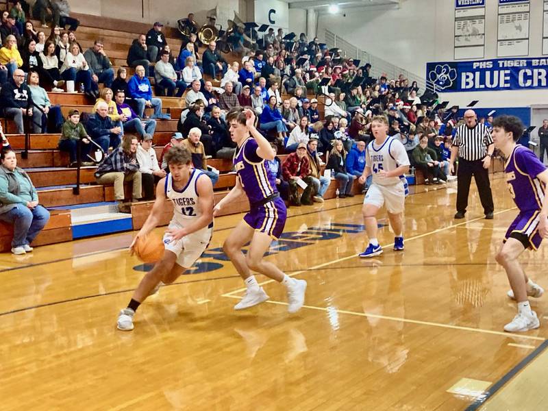 Princeton's Asa Gartin drives to the basket against Mendota Friday night at Prouty Gym. The Trojans won 60-52.
