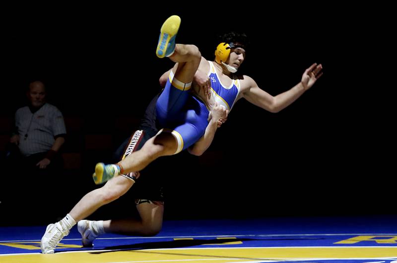 Richmond-Burton’s Blake Livdahl takes  Johnsburg’s Duke Mays down in the 150-pound match of a Kishwaukee River Conference wrestling meet on Thursday, Jan. 30, 2025, at Johnsburg High School.