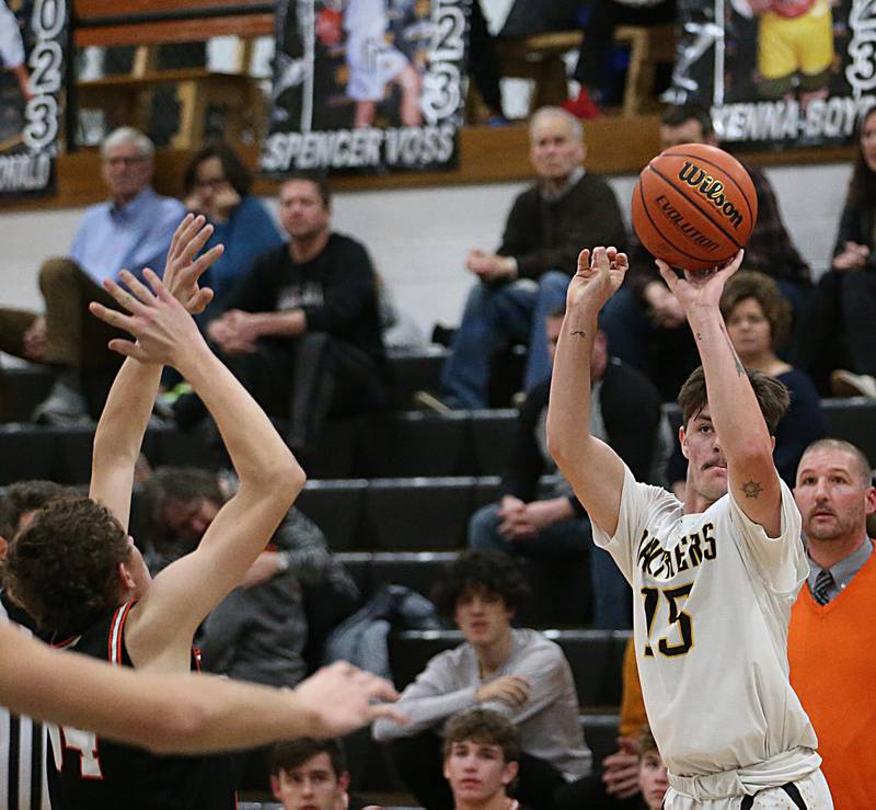 Putnam County's Spencer Voss shoots a shot over Roanoke-Benson's Kaden Harms during the Tri-County Conference Tournament on Tuesday, Jan. 24, 2023 at Putnam County High School.