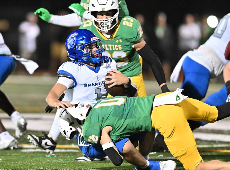 Providence Catholic's Tyler Payne (8) looks to pass the ball during the non-conference game against St. Francis on Friday, SEP. 26, 2025, at New Lenox.