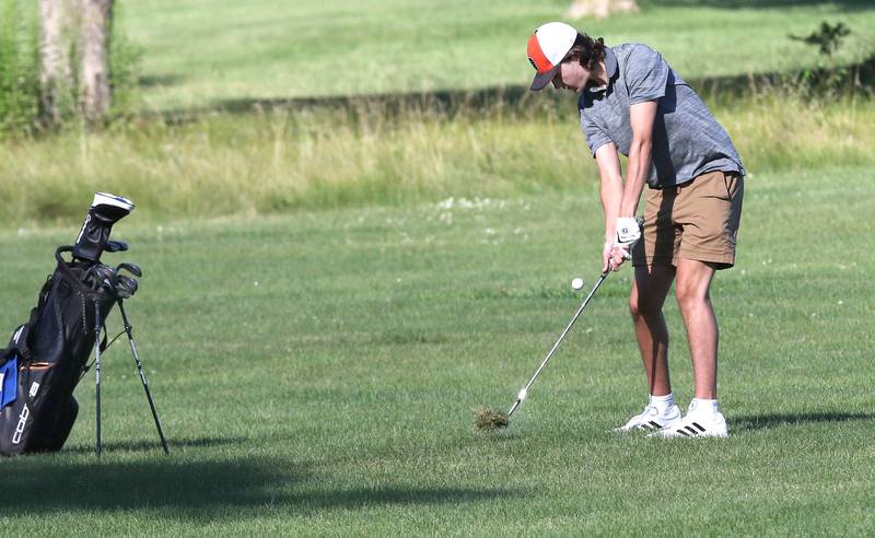 DeKalb's TJ Fontana chips onto the 4th green Tuesday, Aug. 9, 2022, during golf practice at River Heights Golf Course in DeKalb.