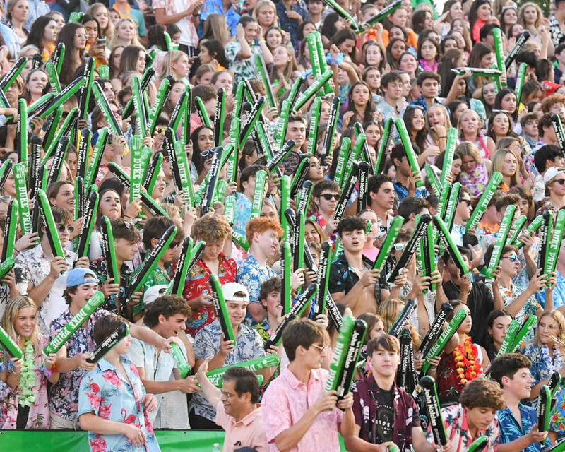 York fans use nose sticks during pregame on Friday Sep. 1, 2023, before taking on Nazareth Academy in Elmhurst.