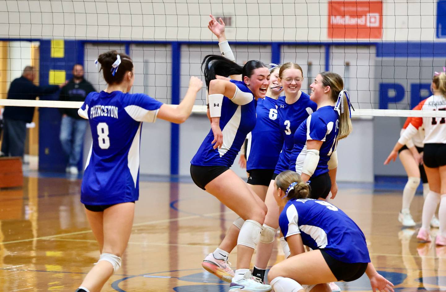 The Princeton Tigresses celebrate Tuesday's regional semifinal win over Kewanee at Prouty Gym. The Tigresses advance to Thursday's finals against Newman.