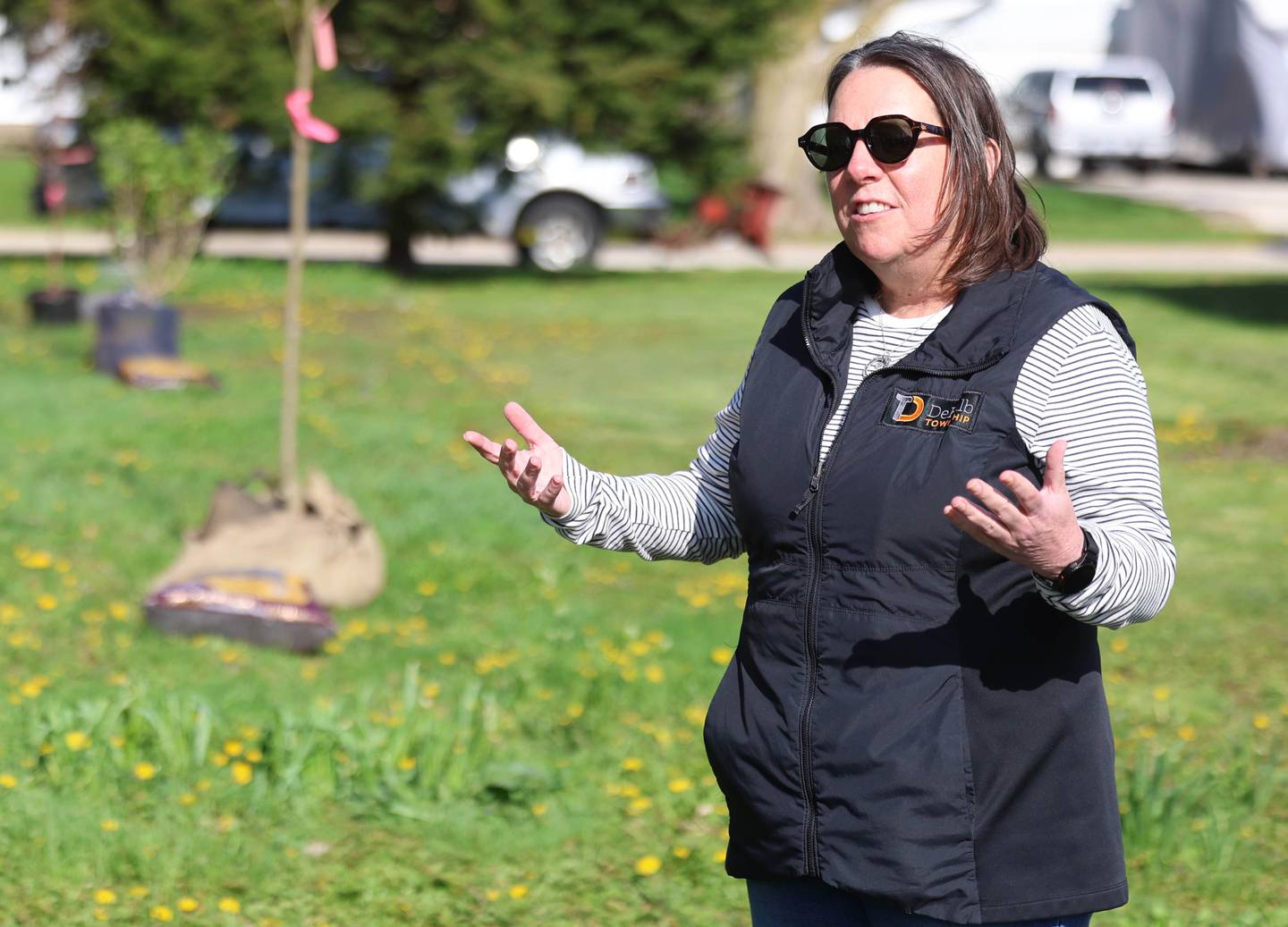 Mary Hess, supervisor at the DeKalb Township, speaks Tuesday, April 21, 2026, before the tree planting at Elder Care Services in DeKalb. Several trees were planted by volunteers at the location as part of the townships 250 Trees for Tomorrow initiative.