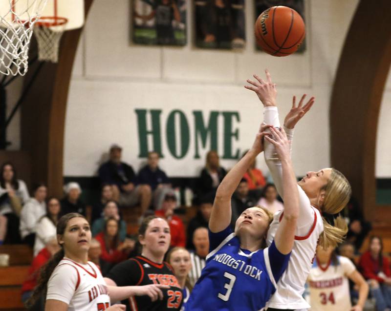 Woodstock's Keira Bogott battles for a rebound with Huntley's Anna Campanelli during the girl’s game of McHenry County Area All-Star Basketball Extravaganza on Sunday, April 13, 2025, at Alden-Hebron’s Tigard Gymnasium in Hebron.