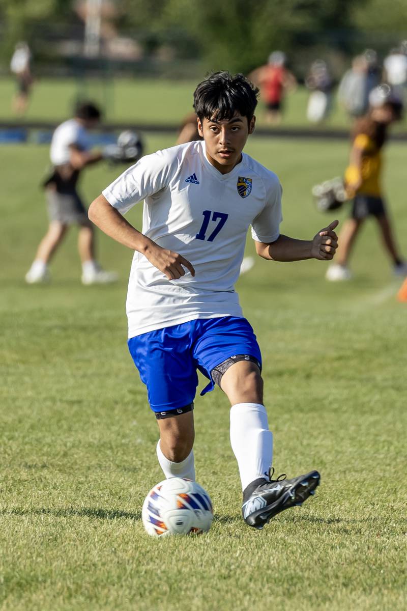Joliet Central's Mauricio Rojas looks to pass during a varsity soccer game against Joliet Catholic at Joliet Catholic on Sept. 8, 2025.