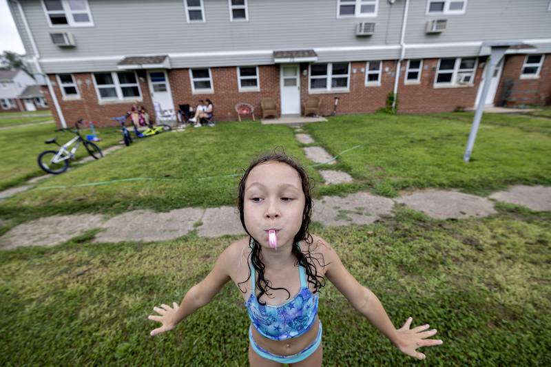Aniyah Howards, 8, blows her whistle Friday, Aug. 1, 2025, in Rock Falls during a day of fun at the Coloma Township Homes in Rock Falls.