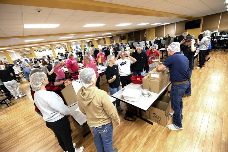 FFA groups from six high school work on building the meals Wednesday, Nov. 6, 2024, at Sterling High School.
