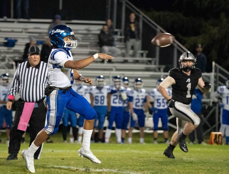 Riverside Brookfield's Diego Gutierrez (5) throws a pass against Kaneland during a 6A playoff football game at Kaneland High School in Maple Park on Friday, Oct 28, 2022.