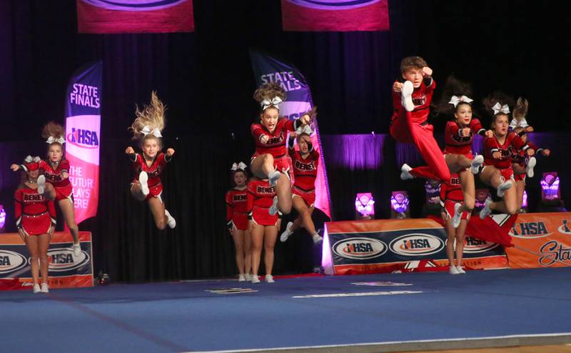 Members of the Benet Academy cheerleading team perform at the Competitive Cheerleading State Final Competition on Saturday, Feb. 3, 2024 at Grossinger Motors Arena in Bloomington.