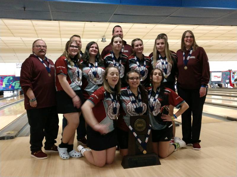 The Lockport bowling team celebrates its state championship it achieved on Saturday. It was the program's sixth state title.