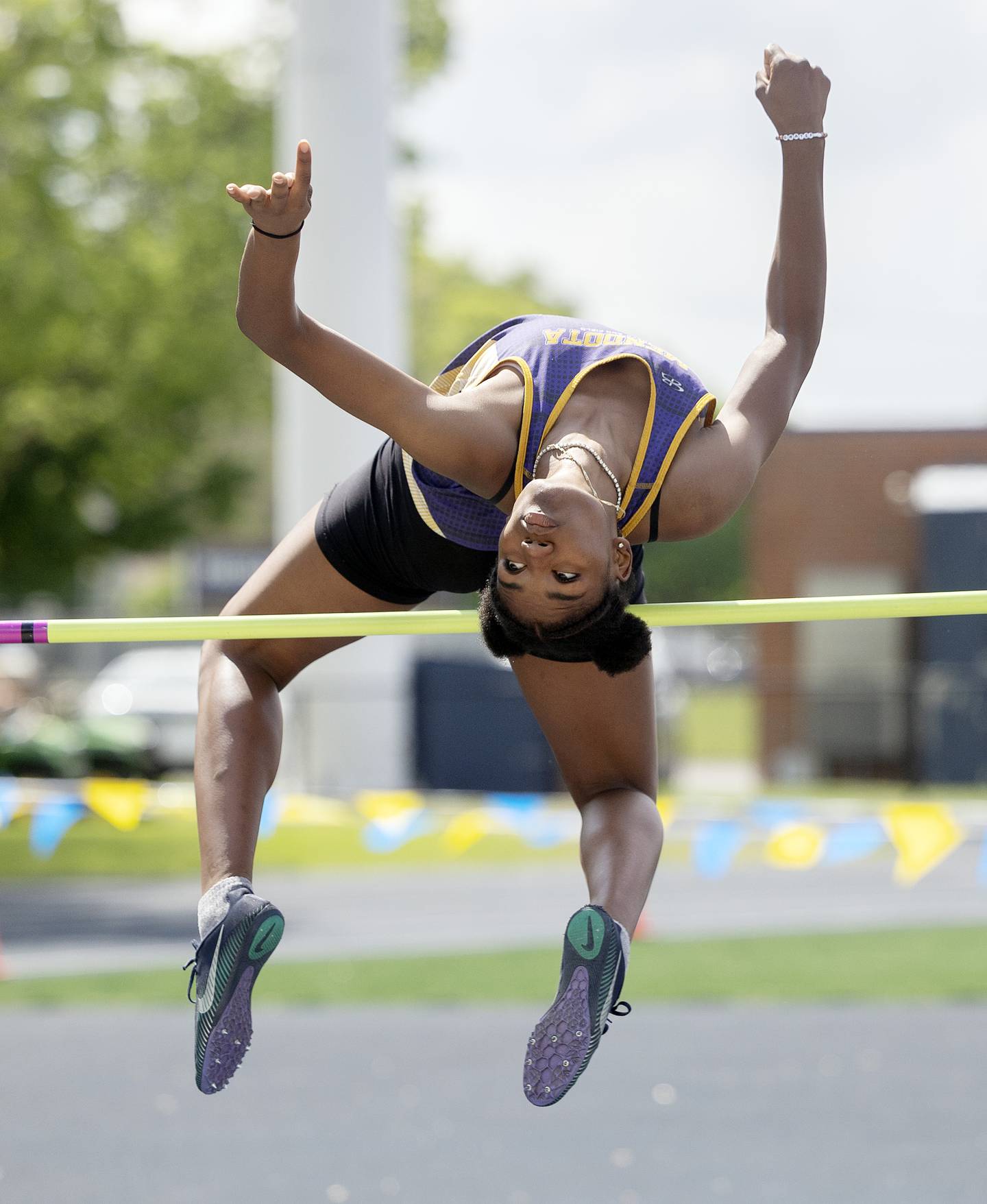 Mendota’s Mariyah Elam clears the bar in the high jump to qualify for state Wednesday, May 14, 2025, during Sectionals at Sterling High School.