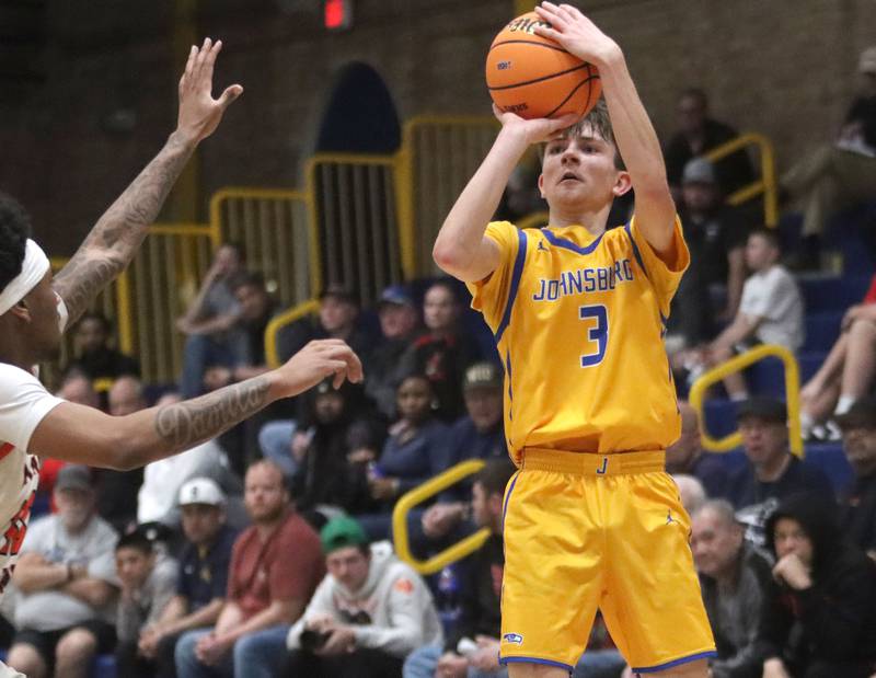Johnsburg’s Trey Toussaint shoots the ball against Peoria Manual in boys IHSA Class 2A Supersectional basketball on Monday, Mar. 9, 2026, at Sterling High School in Sterling.