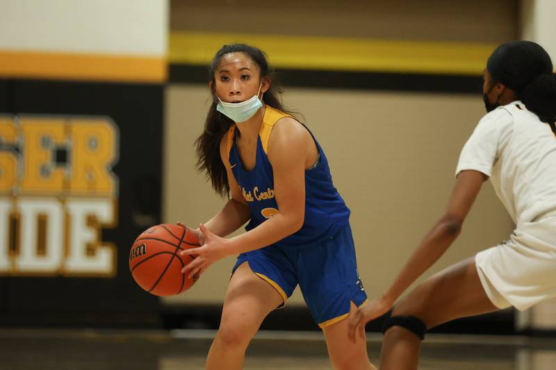 Joliet Central’s Lillian Luangsomkham looks for a play against Joliet West. Tuesday, Feb. 8, 2022, in Joliet.