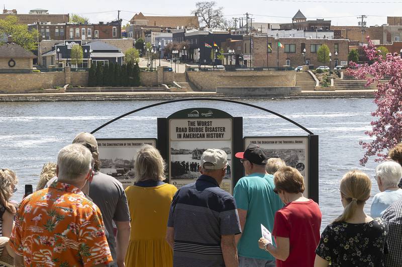 Visitors check out an informational display of the Truesdell Bridge collapse Sunday, May 7, 2023 on the north side of the Rock River in Dixon.
