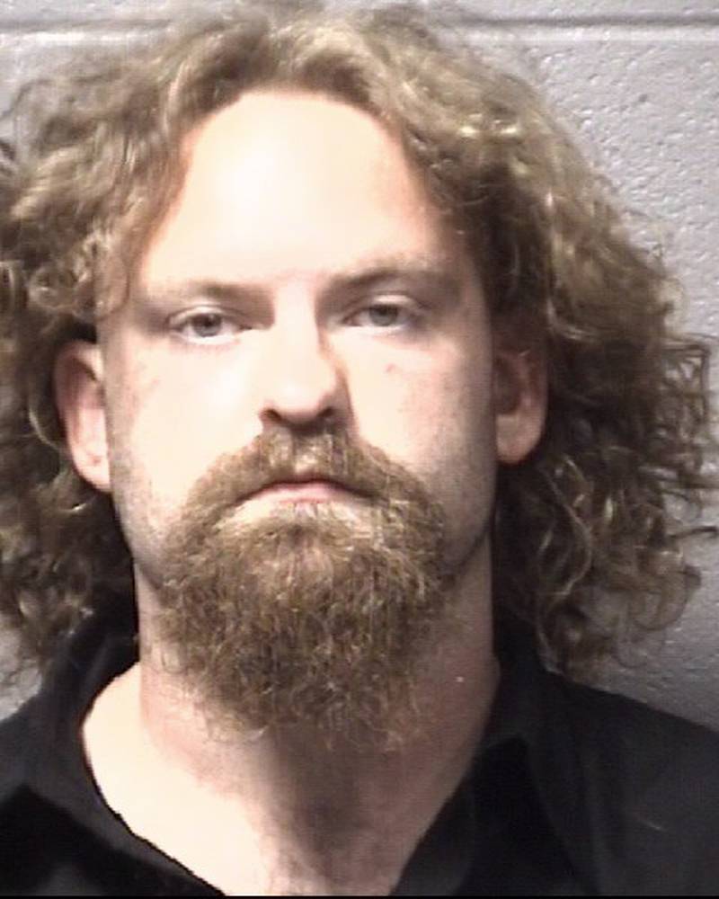 Zachary Brust was arrested at a Motel 6 in Sycamore on July 30, 2023 and charged with home invasion, unlawful restraint, aggravated battery, and battery after Sycamore Police say they received a call regarding man following a woman down a hotel hallway and forcing his way into the room.