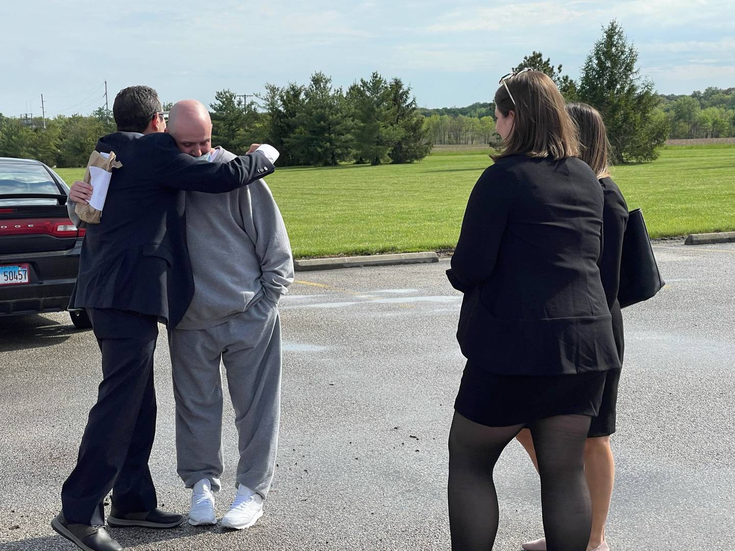 Kenneth Smith, 45, and attorney David Jimenez-Ekman  hug after walking out of Lawrence Correctional Center in Sumner on Thursday, May 6, 2021. Smith served nearly 20 years for the 2001 murder of Raul Briseno.