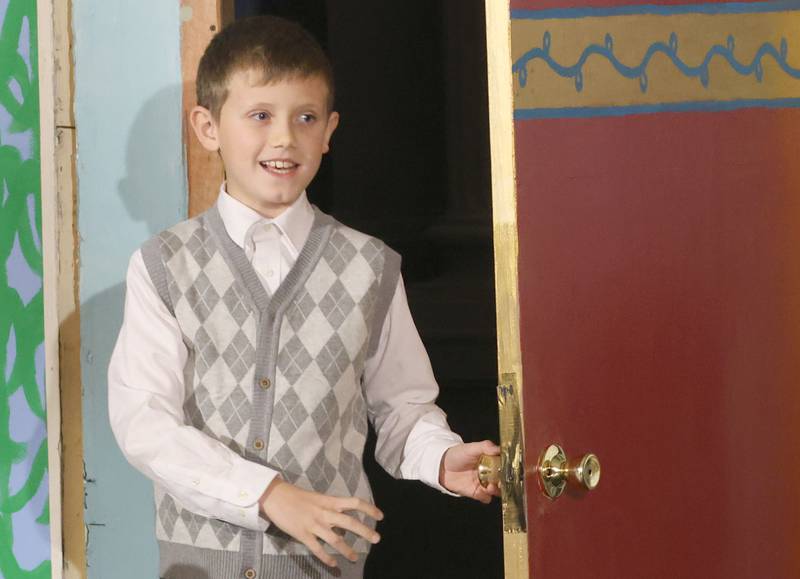 Maddux Bell as Mr. Bloom, acts out a scene during a rehearsal of “The Magic of Christmas” the Children’s Christmas Musical on Tuesday, Nov. 11, 2025 at the Prairie Art’s Center in Princeton.
