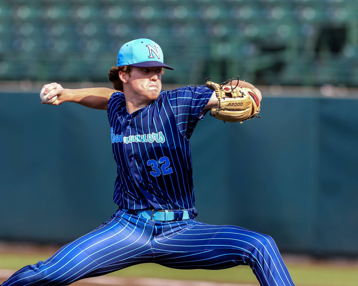 Nazareth's Finn O 'Meara (32) delivers a pitch during the Class 3A Crestwood Supersectional game between St. Ignatius at Nazareth.  June 6, 2022.