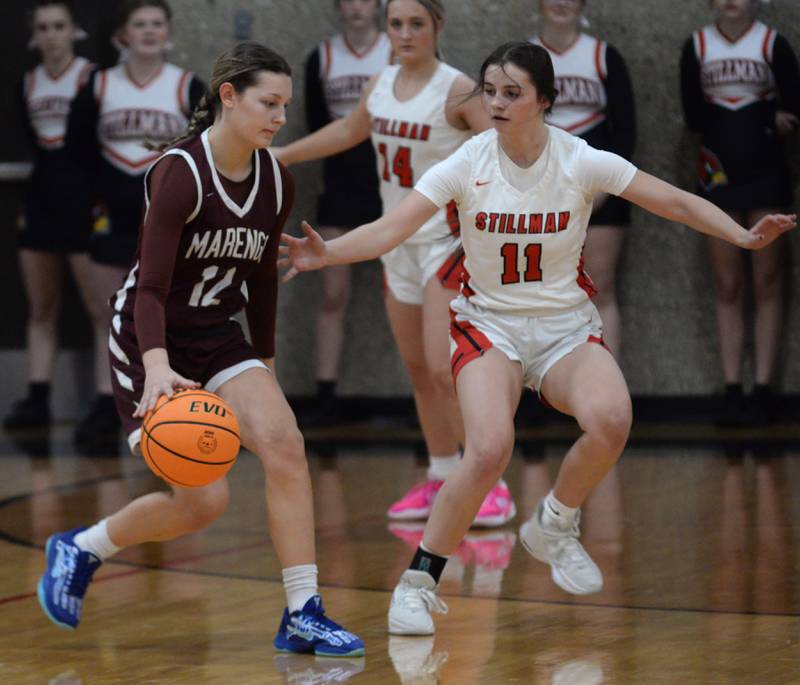 Marengo's Paige Aubrey (11) dribbles as Stillman Valley's Joslyn Nanni (11) defends at the 2A Stillman Valley Regional on Monday, Feb. 17, 2025 at Stillman Valley High School.