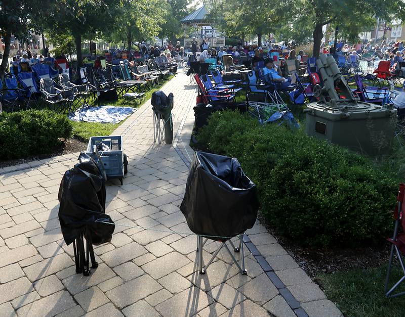 Chairs are set up over an hour before the start of Huntley’s weekly Concert on the Square Tuesday, Aug. 8 2023. One of These Nights an Eagles tribute band will be performing the concert.