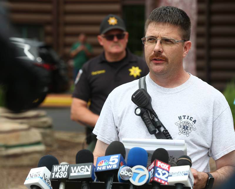 Utica Fire assistant chief Drew Partain speaks to the media during a press conference at Grand Bear Lodge on Tuesday, May 31, 2022. A fire fueled by high winds destroyed 28 cabins on the property. No injuries were reported.